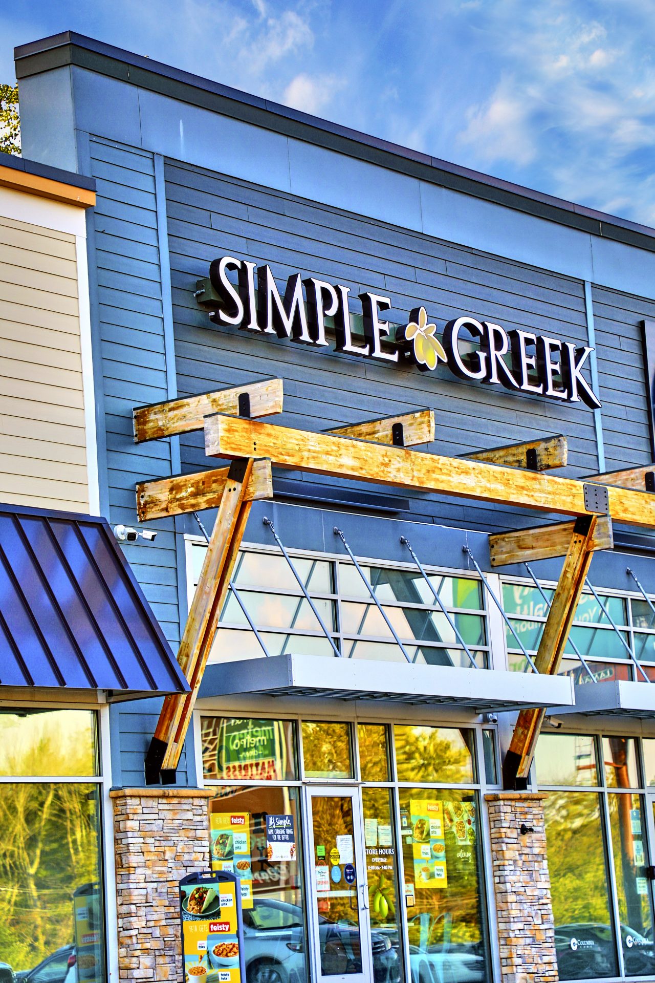 A building sign, placed above a business entrance