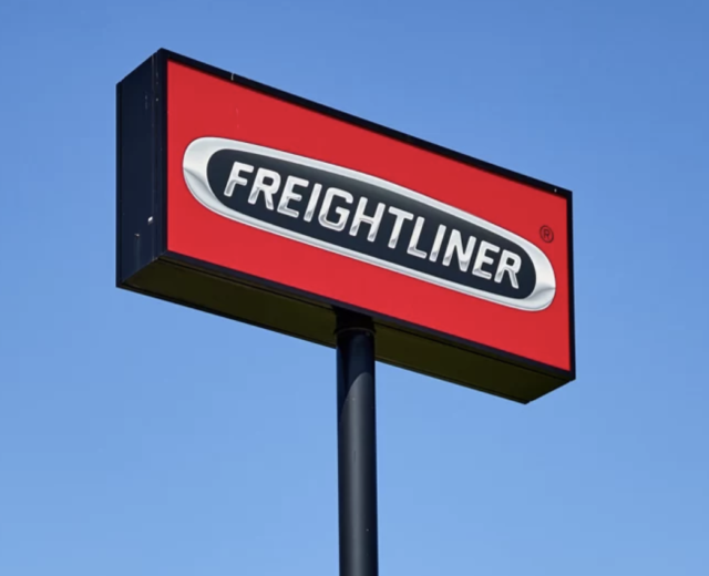 Post Box Sign High Above a Highway for Freightliner 
